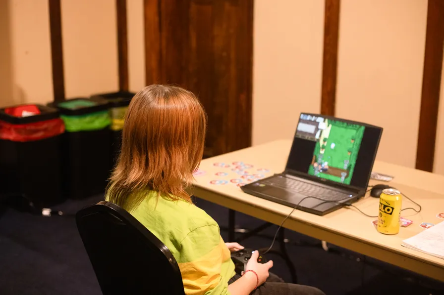 A child playing "End of Ember" by Bad Plan
Studios