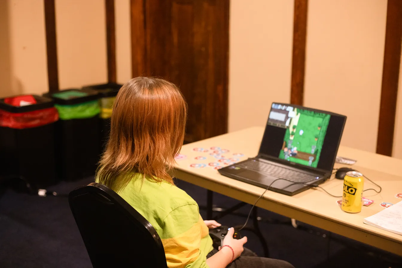 A child playing “End of Ember” by Bad Plan
Studios