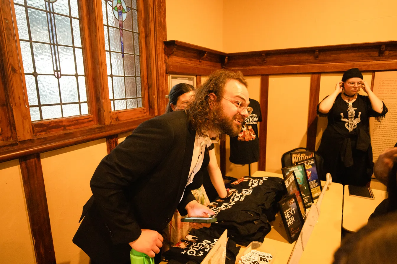 Haydn Richards-Pudney managing our merch
stand