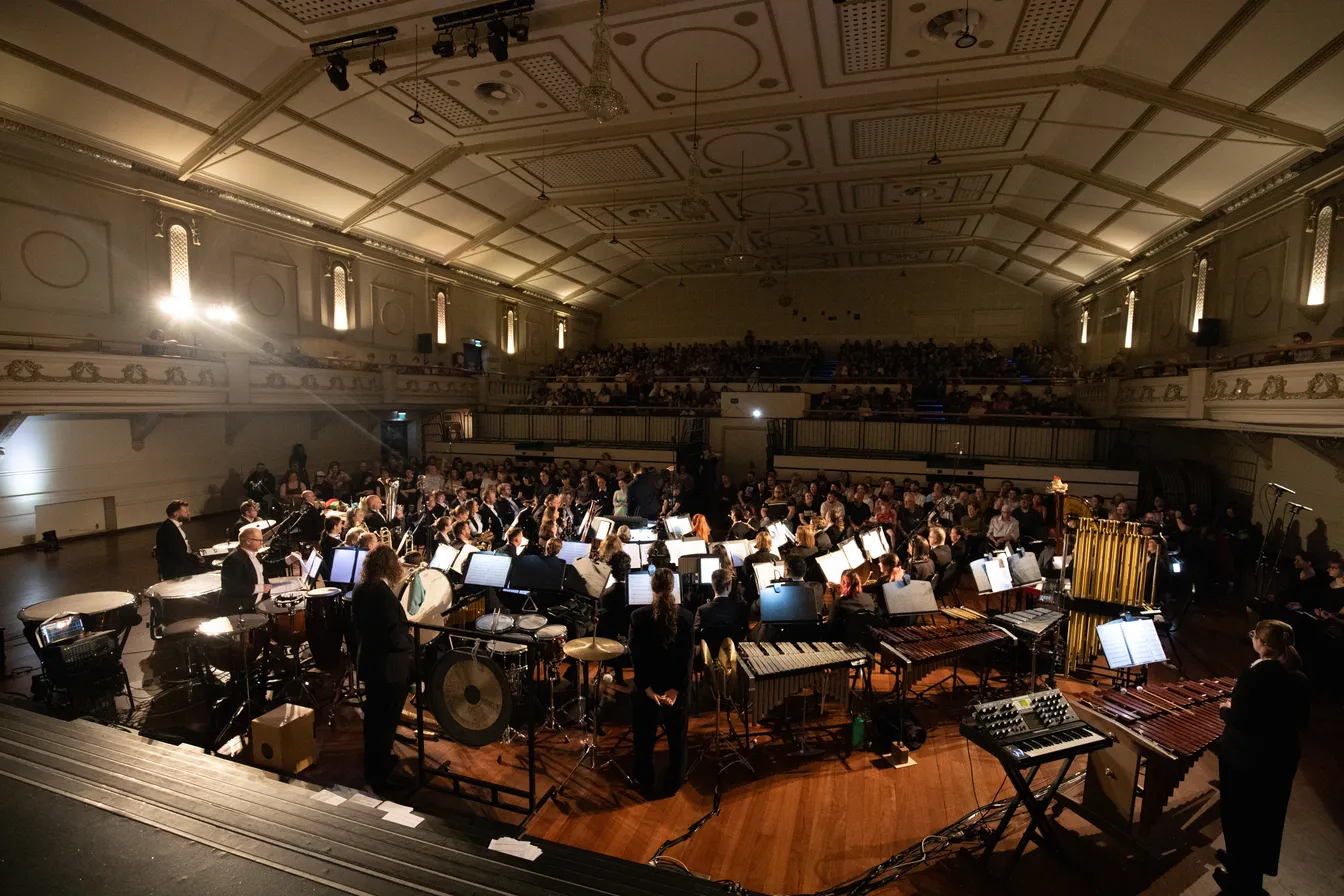 A view from behind the stage of the full venue
