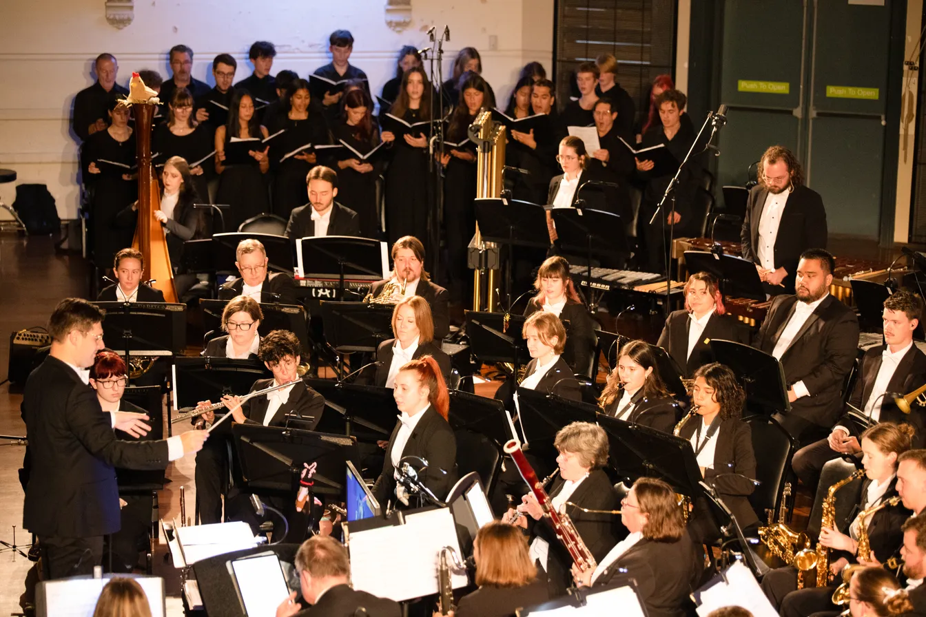 Some of the Woodville Concert Band and Woodville High School Senior Choir on stage